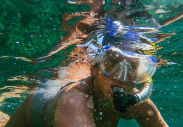 child snorkeling