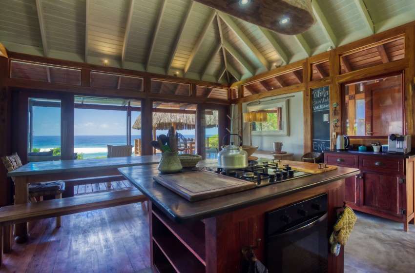 Kitchen with island at Aloha 6 in Ponta Mamoli