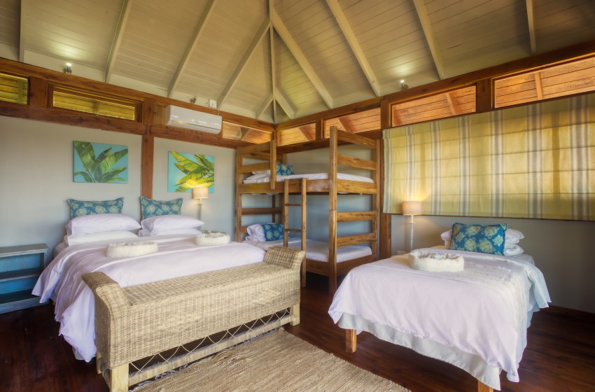 Bedroom with 2 beds at Aloha 6 in Ponta Mamoli