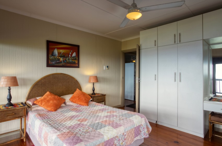 Bedroom 1 with cupboards at Campismo Ninho 23 in Ponta Malongane