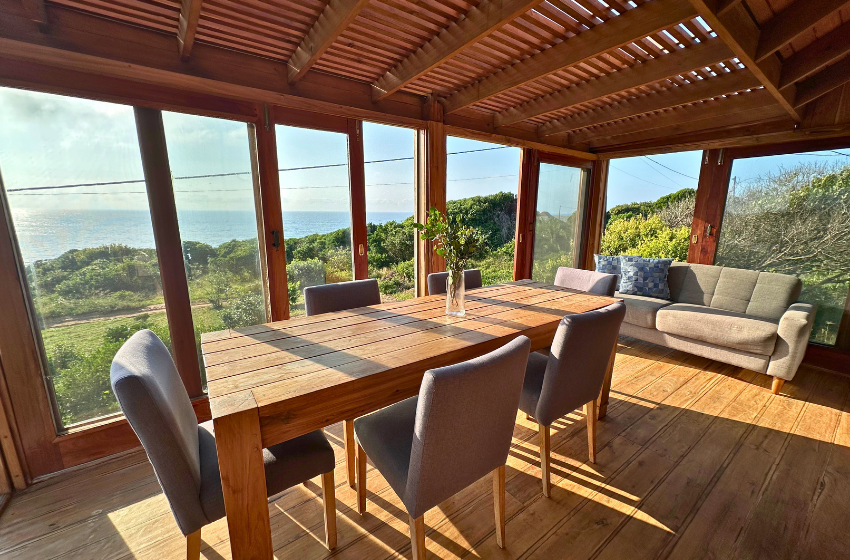 Living area with sea view at Honey's House in Ponta Mamoli