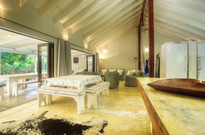 Living area with bush view at Baleia Azul 26 in Ponta Mamoli