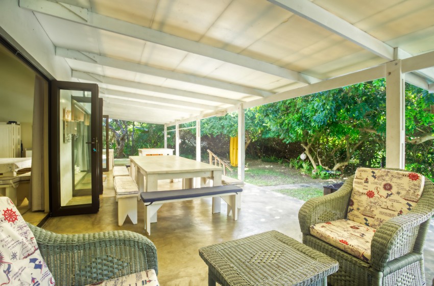 Exterior lounge area at Baleia Azul 26 in Ponta Mamoli