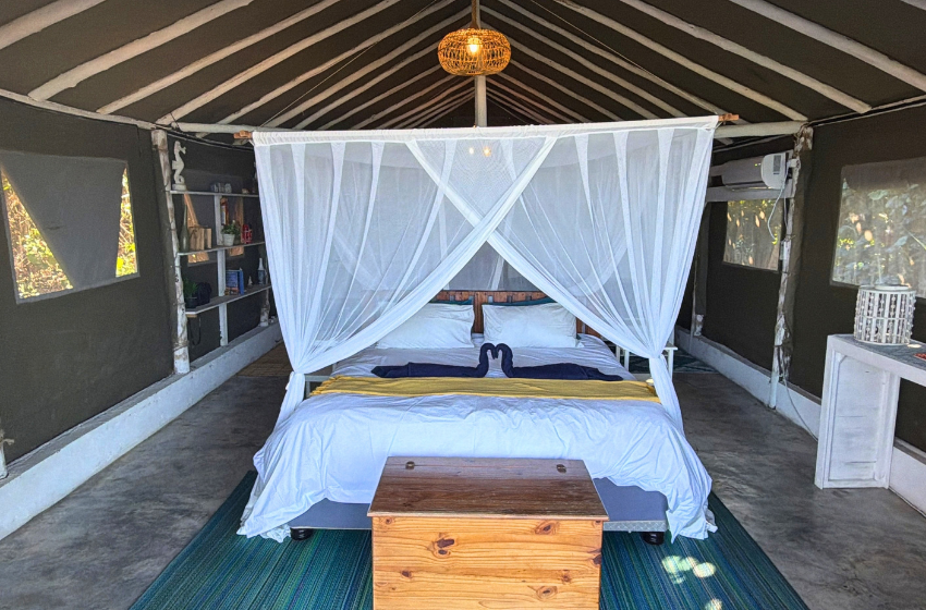 bedroom at Baleia azul beachfront tent 7 in Ponta Mamoli