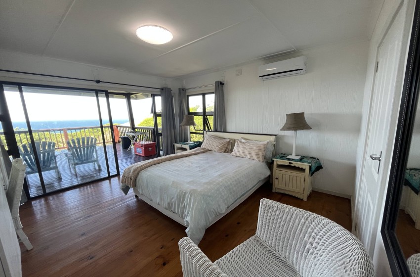 bedroom 1 with seating at campismo ninho 28 in Ponta Malongane
